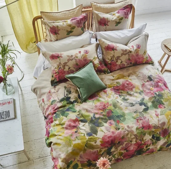 Embroidered duvet covers with intricate needlework for a luxurious touchDesigners Guild Thelma's Garden Fuchsia Bedding