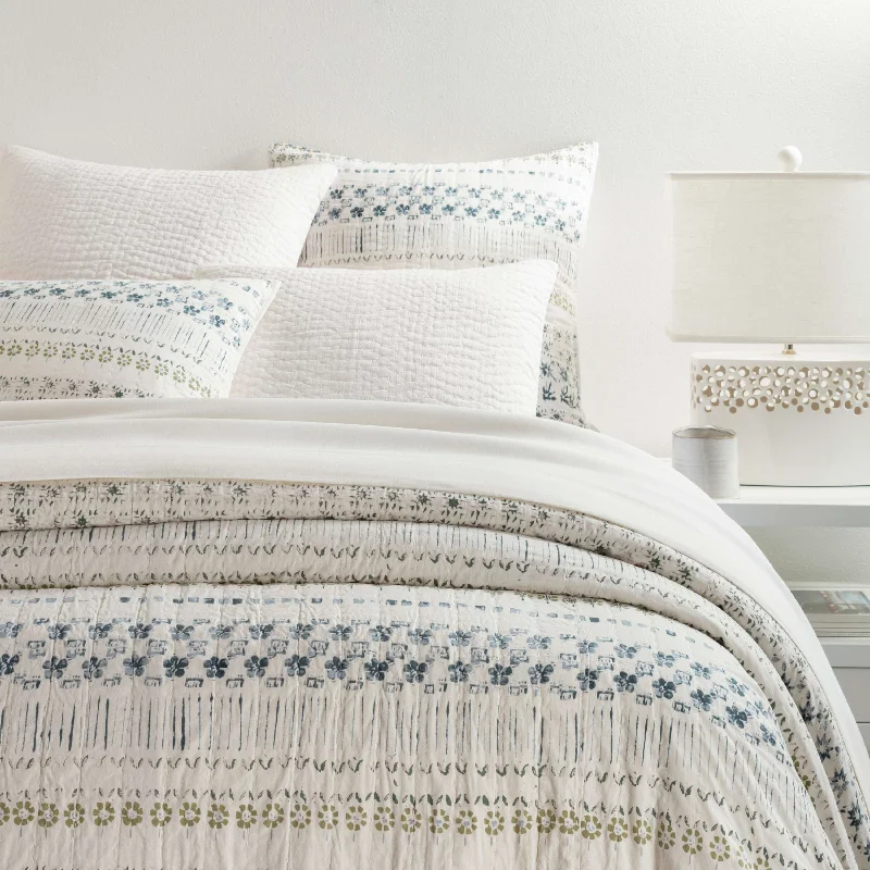 Patchwork duvet covers with a variety of fabric pieces sewn together for a rustic charmPine Cone Hill Hawthorn Coverlet