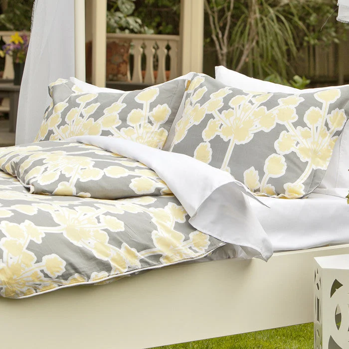 Patchwork duvet covers with a variety of fabric pieces sewn together for a rustic charmSpring Yellow Ashbury Duvet Cover