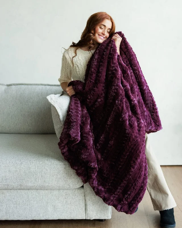 Recycled polyester blankets for an eco - conscious optionGlossy Ultra Sorbet Plum Blanket